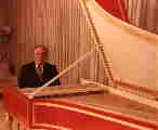 Willard A. Palmer at his harpsichord 'Big Red'